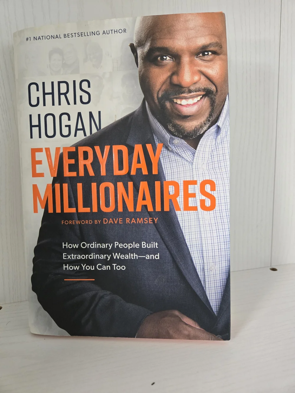 Everyday Millionaires Book - Orange & White Cover by Chris Hogan